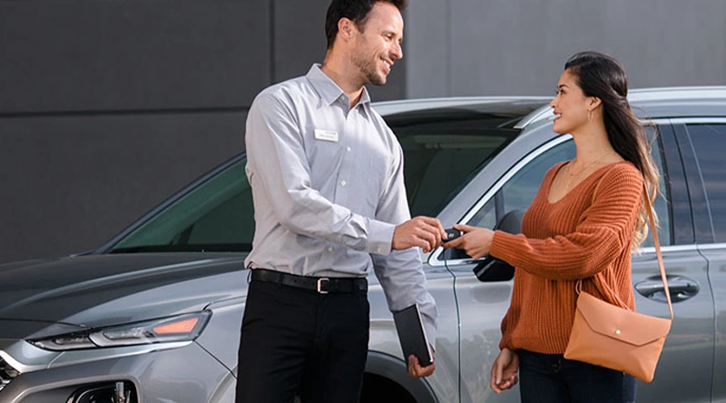 Happy customer buying a vehicle